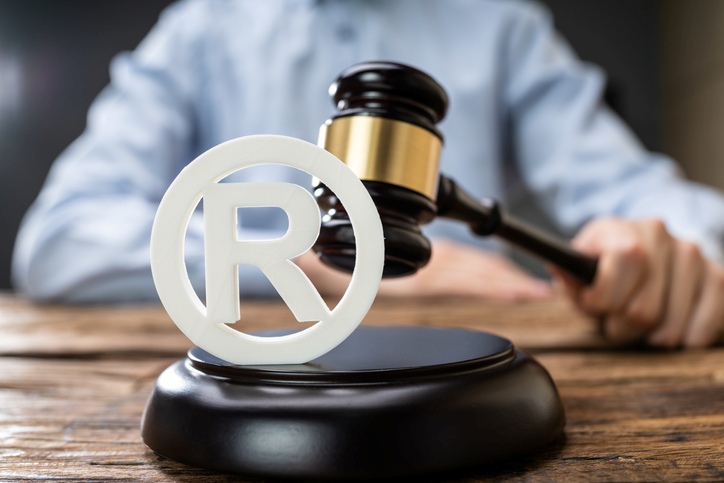 A gavel and a symbol on a table

AI-generated content may be incorrect.